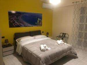 Posteľ alebo postele v izbe v ubytovaní B&B Al Duomo Milazzo