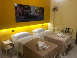 Posteľ alebo postele v izbe v ubytovaní B&B Al Duomo Milazzo