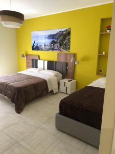 Posteľ alebo postele v izbe v ubytovaní B&B Al Duomo Milazzo