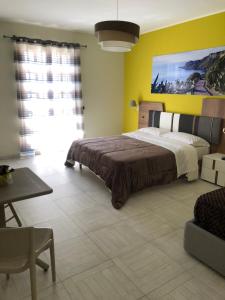 Posteľ alebo postele v izbe v ubytovaní B&B Al Duomo Milazzo