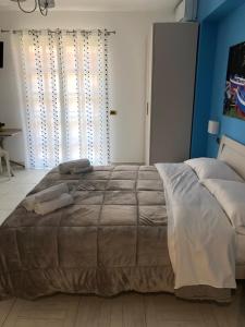 Posteľ alebo postele v izbe v ubytovaní B&B Al Duomo Milazzo