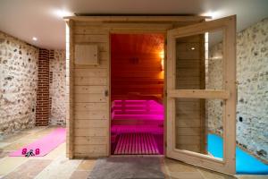 New Cottage & spa de nage Guesthouse客房内的一张或多张床位