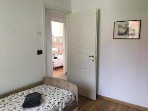 Łóżko lub łóżka w pokoju w obiekcie VILLA DEGLI ULIVI