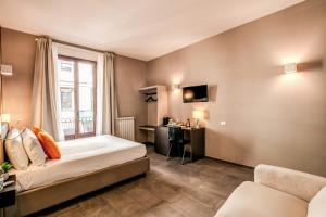 Televízia a/alebo spoločenská miestnosť v ubytovaní H501 Luxury Rooms