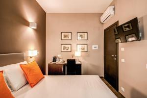 Televízia a/alebo spoločenská miestnosť v ubytovaní H501 Luxury Rooms