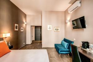Televízia a/alebo spoločenská miestnosť v ubytovaní H501 Luxury Rooms