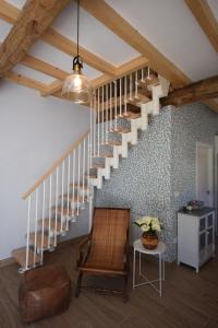 A seating area at Catapeixe Holiday Apartments