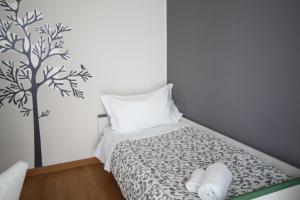 Postel nebo postele na pokoji v ubytování MyRoom In Town