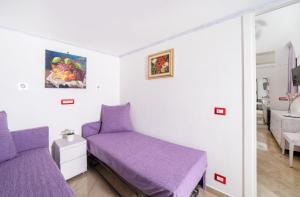 Posteľ alebo postele v izbe v ubytovaní Capri Dreaming