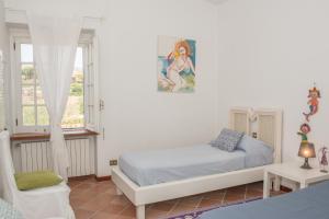 Katil atau katil-katil dalam bilik di Villa Mare Tra Cielo e Mare