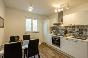 Kuchyňa alebo kuchynka v ubytovaní 2Bfree Apartments