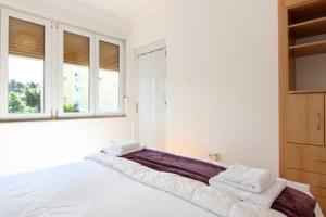 Posteľ alebo postele v izbe v ubytovaní Nina, apartment in city centre
