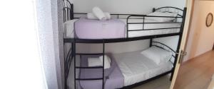 Кровать или кровати в номере Skala Pearls A2