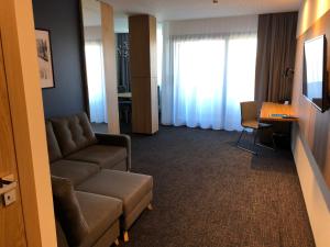 TV a/nebo společenská místnost v ubytování Hotel Olimp Business & Spa