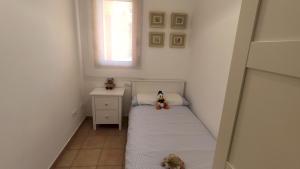 Posteľ alebo postele v izbe v ubytovaní Moderna Villa Cerca de la Playa Almadrava