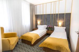 Posteľ alebo postele v izbe v ubytovaní Platinum Residence Boutique