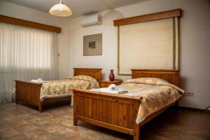 Posteľ alebo postele v izbe v ubytovaní 6 bdr villa with TENNIS COURT