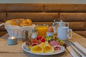Svečiams siūlomi pusryčių variantai apgyvendinimo įstaigoje Hotel Carlton