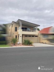 a house on the side of a street at Busselton Holiday Home in Busselton