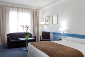 Posteľ alebo postele v izbe v ubytovaní Espahotel Plaza de España