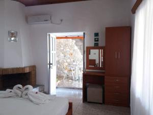 Postel nebo postele na pokoji v ubytování Sunset Guest house