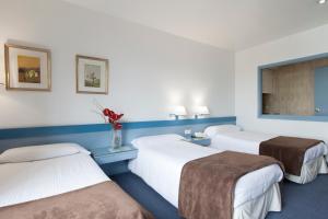 Posteľ alebo postele v izbe v ubytovaní Espahotel Plaza de España