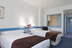 Posteľ alebo postele v izbe v ubytovaní Espahotel Plaza de España