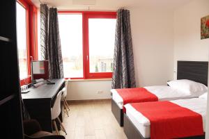 Postel nebo postele na pokoji v ubytování TOP HOTEL