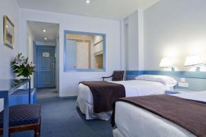 Posteľ alebo postele v izbe v ubytovaní Espahotel Plaza de España