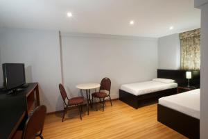 Postel nebo postele na pokoji v ubytování Hotel Moncloa