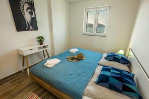 Postel nebo postele na pokoji v ubytování 2Bfree Apartments