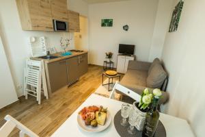 Kuchyň nebo kuchyňský kout v ubytování 2Bfree Apartments