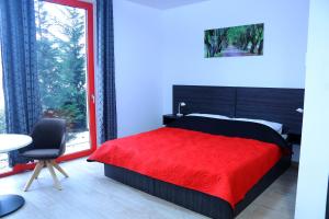 Postel nebo postele na pokoji v ubytování TOP HOTEL