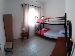Postel nebo postele na pokoji v ubytování Skala Pearls A1