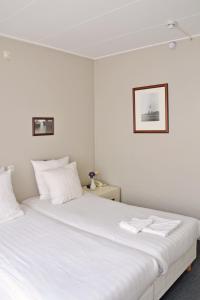 Posteľ alebo postele v izbe v ubytovaní Hotel Koogerend