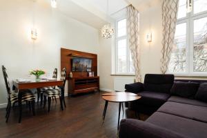 אזור ישיבה ב-Apartments Old Town Piwna by Renters