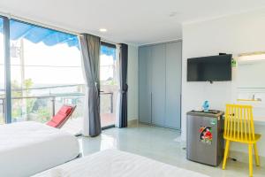 TV a/nebo společenská místnost v ubytování Vivian Hotel Mui Ne