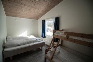 Dviaukštė lova arba lovos apgyvendinimo įstaigoje Dombåstun