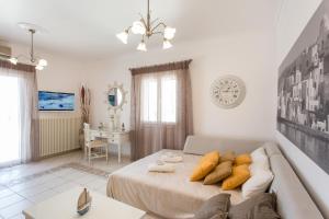 Posteľ alebo postele v izbe v ubytovaní Panos Luxury Suite + 37 fotografií
