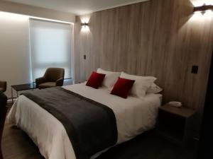 Postel nebo postele na pokoji v ubytování Hotel H9