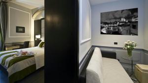 Postel nebo postele na pokoji v ubytování Duca d'Alba Hotel - Chateaux & Hotels Collection