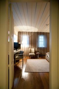 Cama ou camas em um quarto em Hotel da Oliveira