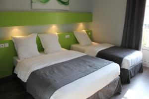 Postel nebo postele na pokoji v ubytování Hotel Esplanade