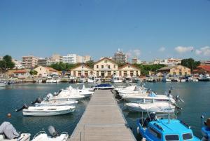a bunch of boats are docked in a marina at Amazing Apartment In The Center in Alexandroupoli