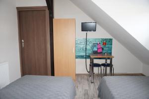 TV a/nebo společenská místnost v ubytování Sejf House