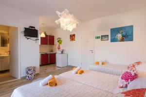 Postel nebo postele na pokoji v ubytování Apartments Lile