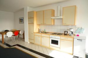 Η κουζίνα ή μικρή κουζίνα στο Ferienwohnung Hahn
