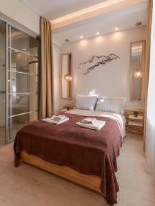Кровать или кровати в номере Sofia Dream Apartment - Premium One Bedroom on Ekzarh Yosif