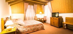 Postel nebo postele na pokoji v ubytování Hotel Stelter