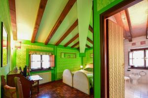 Postel nebo postele na pokoji v ubytování Relais Oroscopo